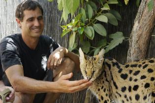 zoo student with serval cat